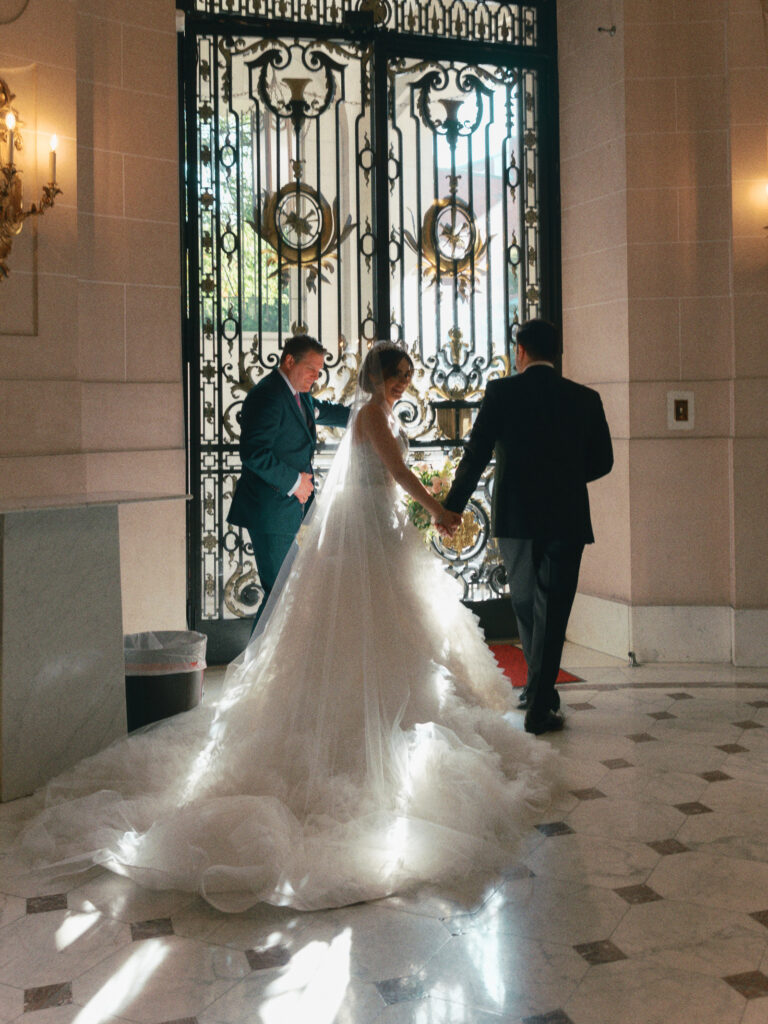 A couple walks into the Perry Belmont House