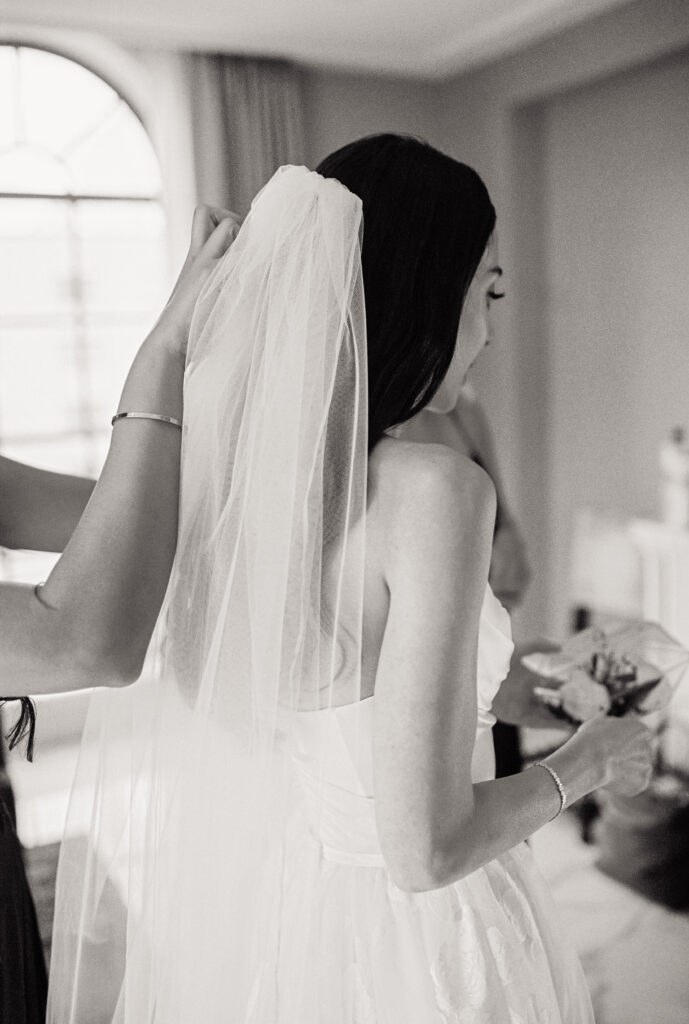 A bride gets ready at the the St. Regis Hotel in Washington, DC