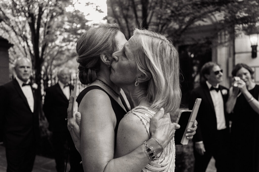 Wedding guest hug at the St. Regis Hotel in Washington, DC