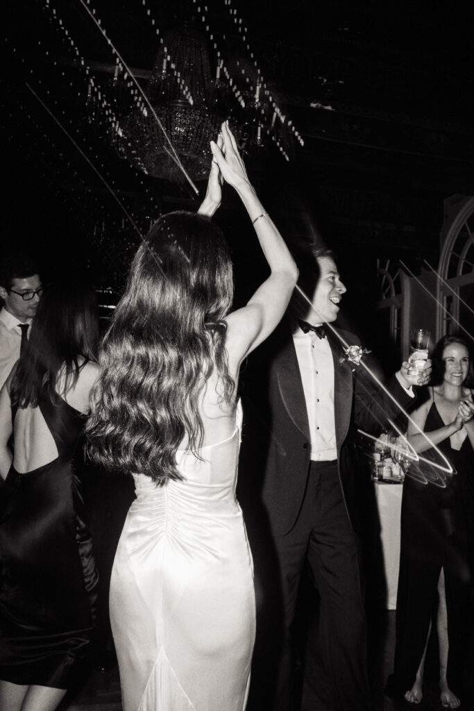 A bride dances at the St. Regis Hotel in Washington, DC