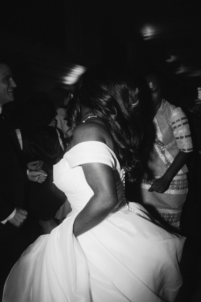 A Union Station wedding bride dances during her reception in Washington DC