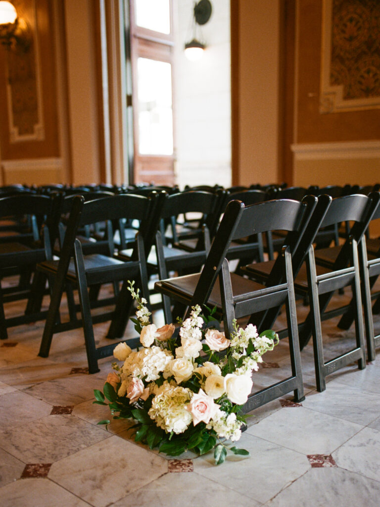 Flowers decorate the wedding ceremony hall of Union Station in Washington DC