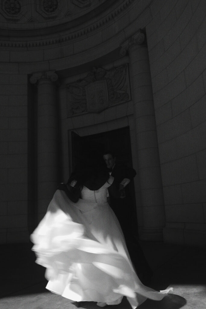 A Union Station wedding couple dances in front of their ceremony in Washington DC